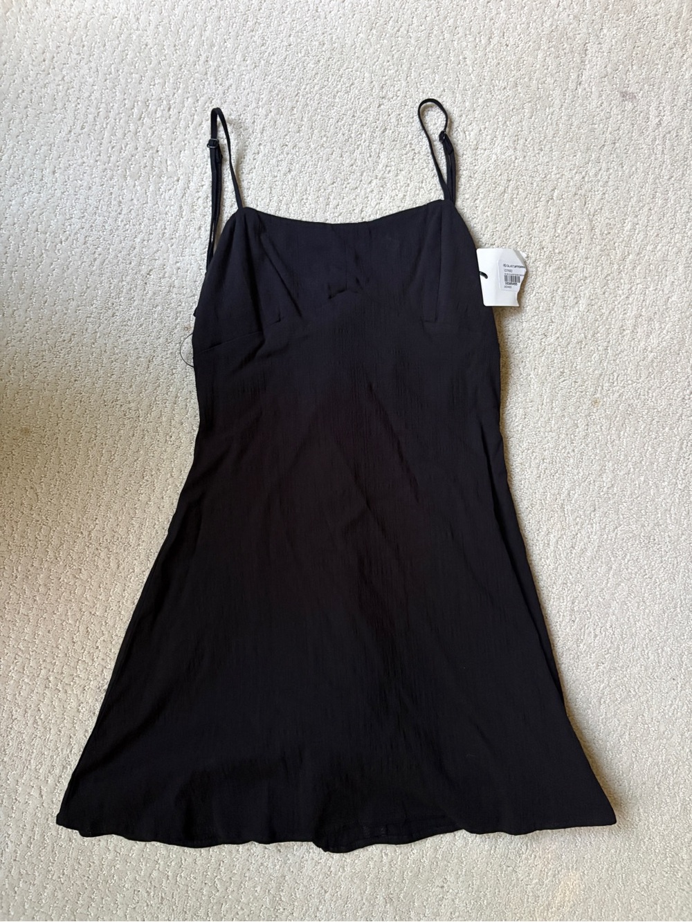 Black Slip Dress with Adjustable Spaghetti Straps and Tie Bow Back